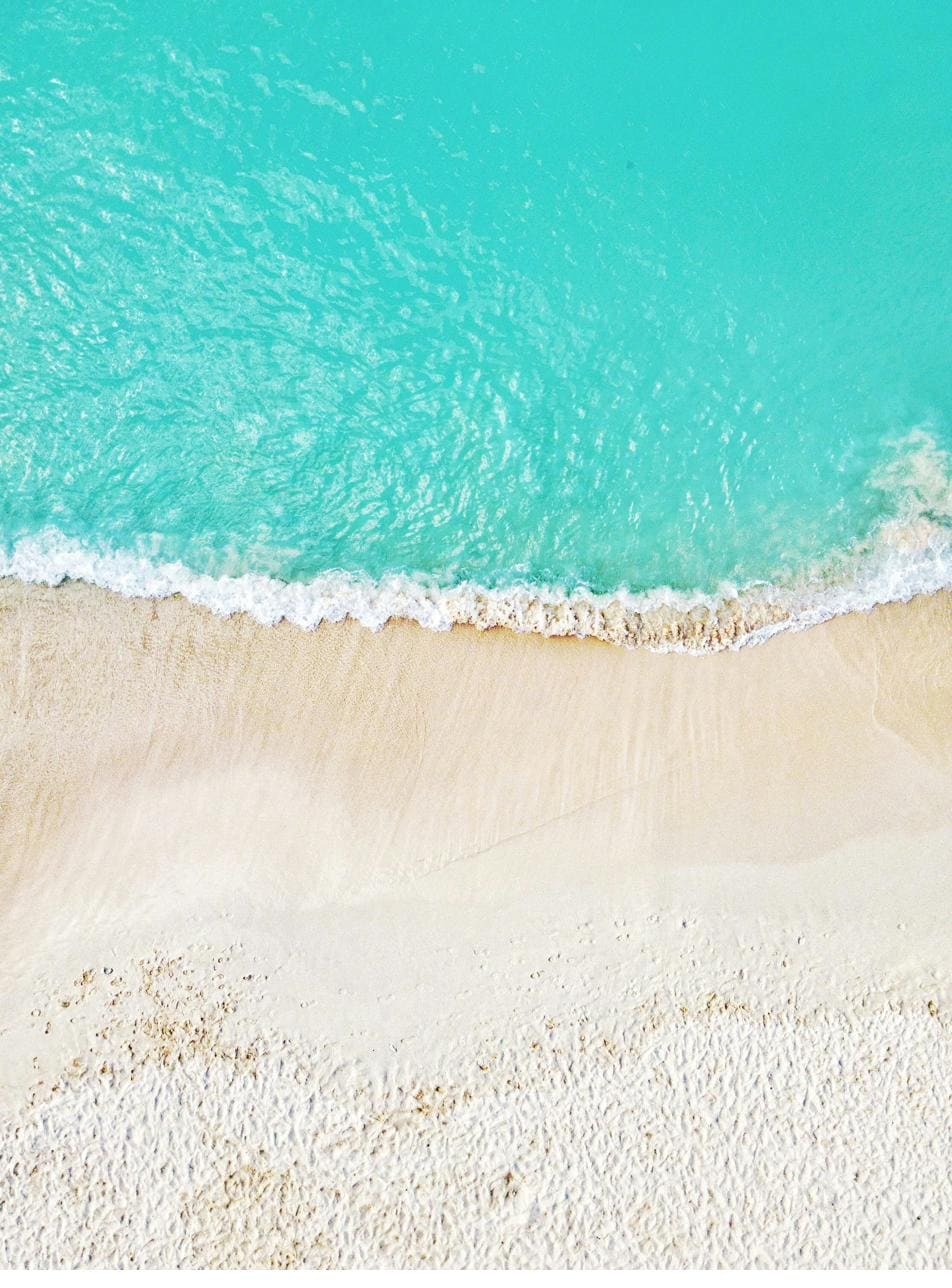 Turquoise water meeting white sand, Grand Cayman